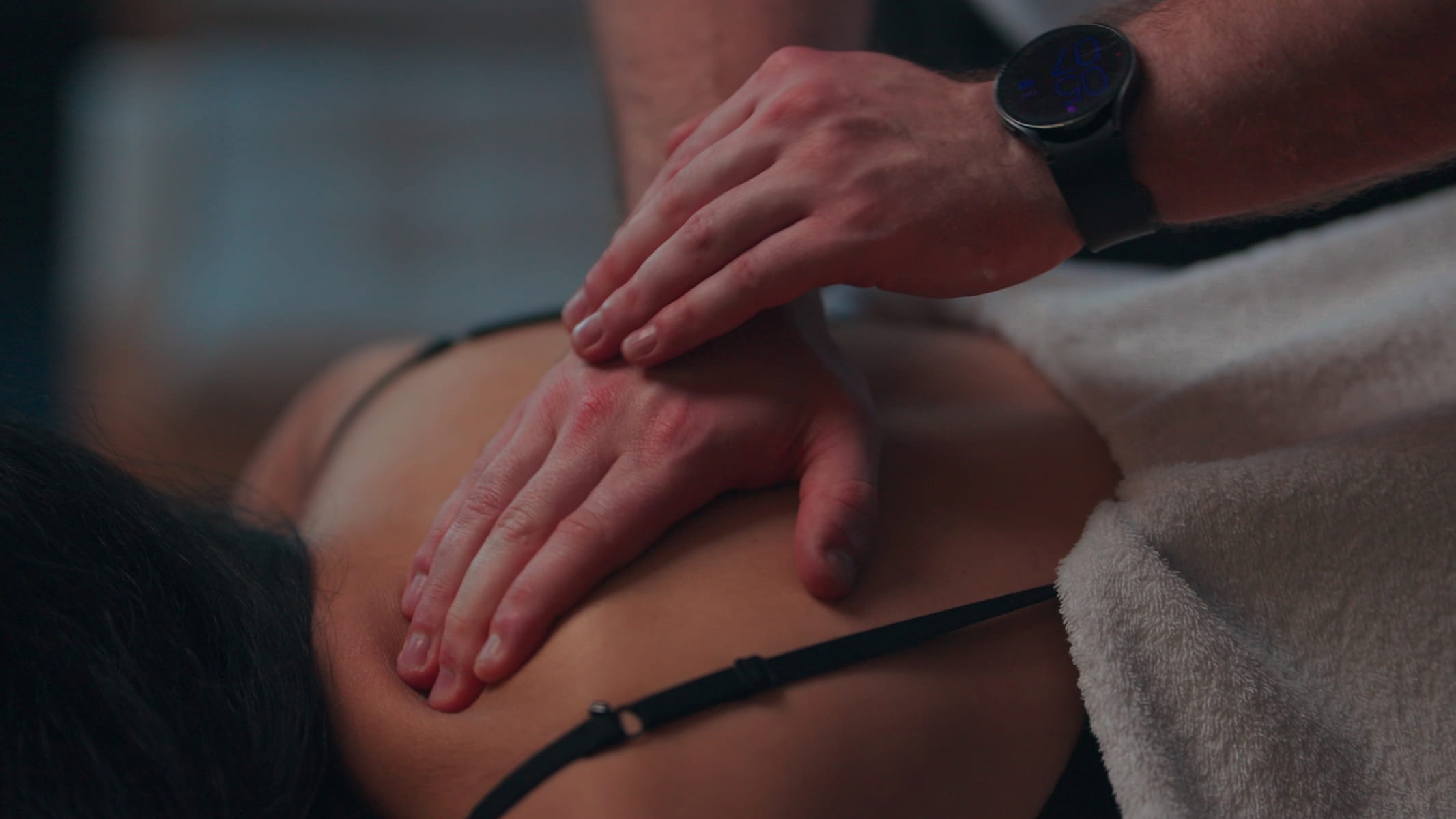 Remedial massage therapist treating shoulder and neck pain at LinksHP Cromer